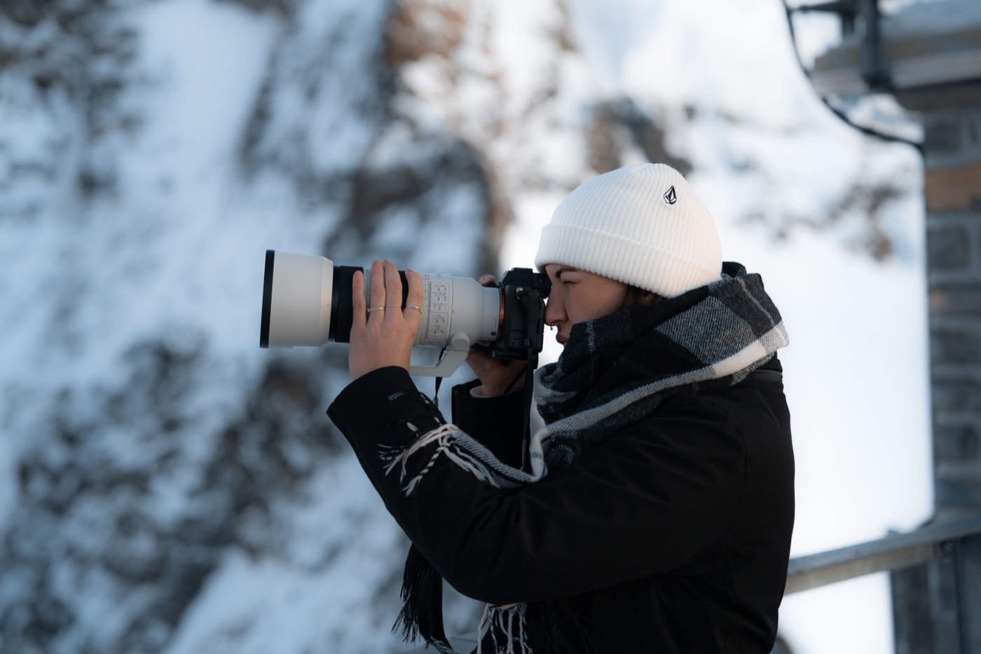 Cheryl Sprecher shooting on a long lens in the snow